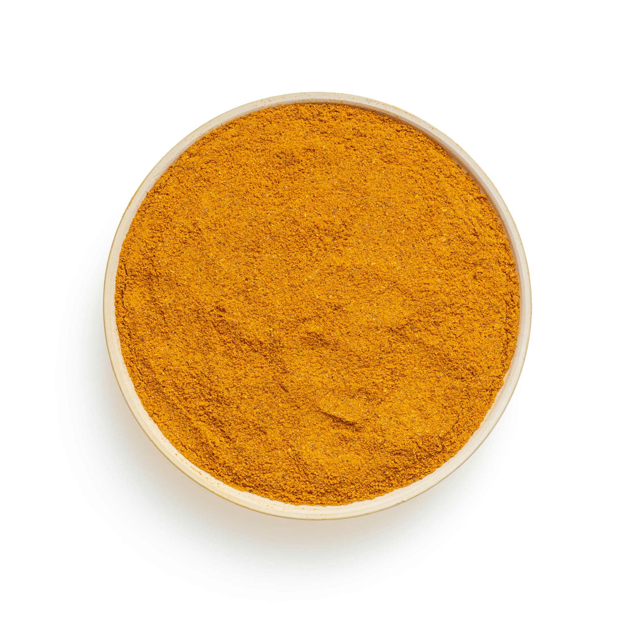 Turmeric powder in a white bowl